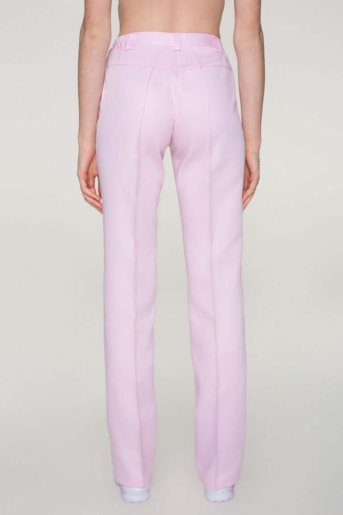 Dámské zdravotnické kalhoty světle růžové od Medireina zdravotnické oděvy. Zdravotnické kalhoty rovného střihu vhodné pro zdravotní sestry a lékaře. 